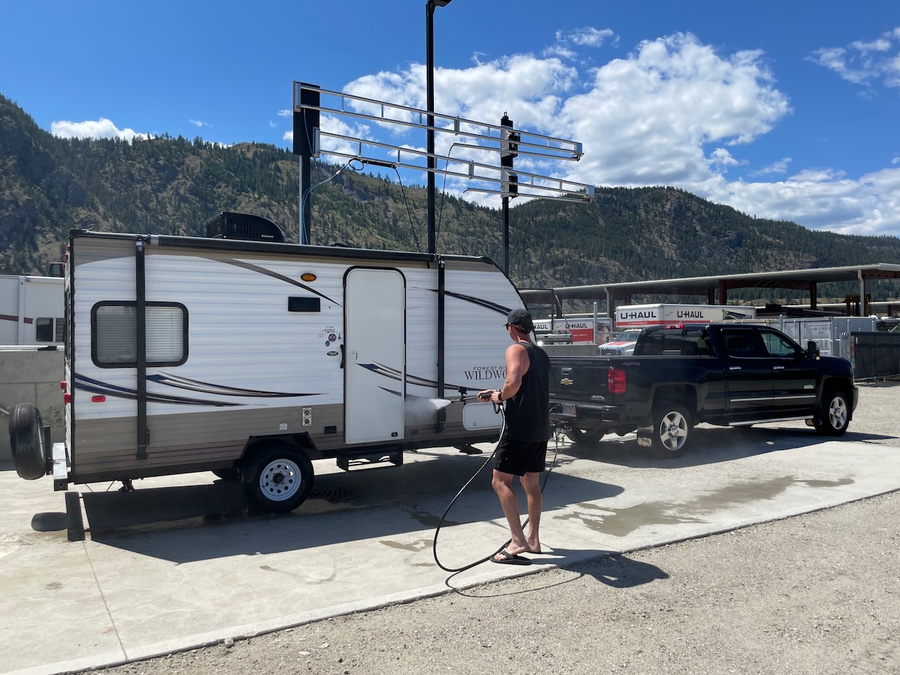 Man washing his trailer